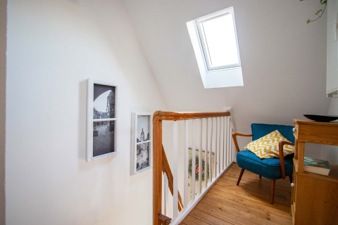 Treppenhaus und Leseecke in der Ferienwohnung Odenwald in 74722 Buchen (Odenwald).