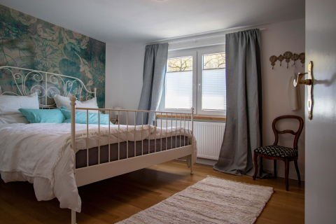 Schlafzimmer in der Ferienwohnung Bauland